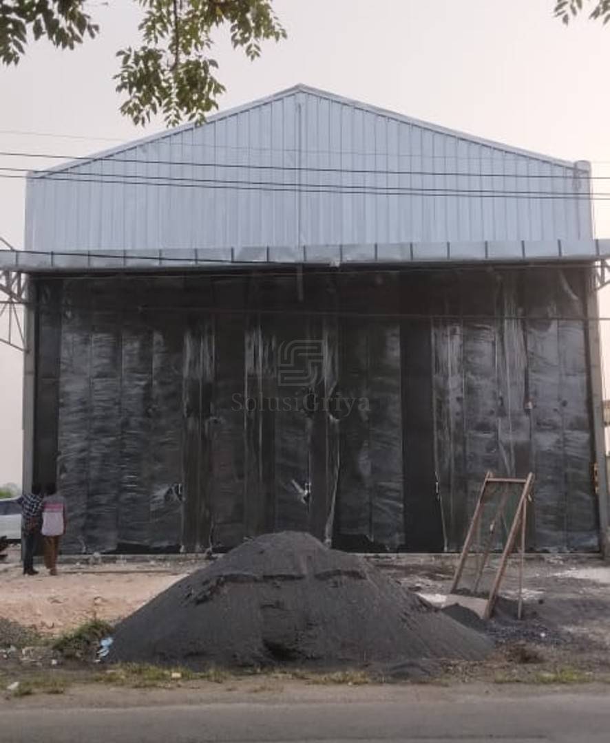 Pintu gudang sliding tikung industrial baja tebal